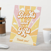 Rosa gelbe Sonnencreme Kinderdusche Bücher & Gesch Sockelschild (In SItu)