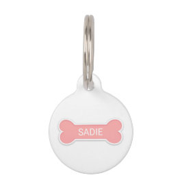 Rosa gestrichener Knochen mit dem benutzerdefinier Haustiermarke