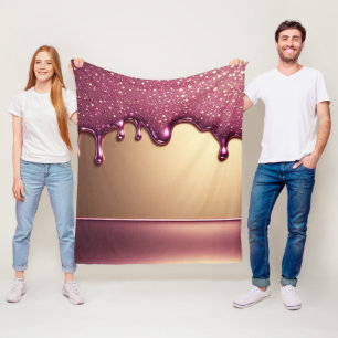 Rosa Glitter-Tropfen über goldenem Metallhintergru Fleecedecke
