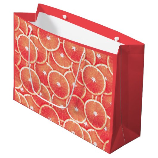 Rosa Grapefruitscheiben Große Geschenktüte (Vorderseite Schrägansicht)