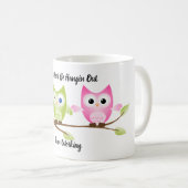 Rosa, Grün und Blau, die auf einer Zweigstelle aus Kaffeetasse (VorderseiteRechts)