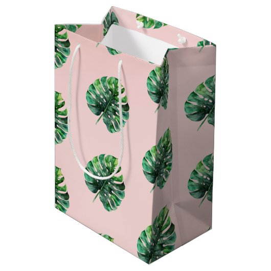 Rosa grüne tropische Blätter mit rosa Pfirsichfarb Mittlere Geschenktüte (Rückseite Schrägansicht)