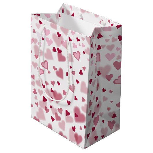 Rosa Herzchen Muster Mittlere Geschenktüte (Rückseite Schrägansicht)