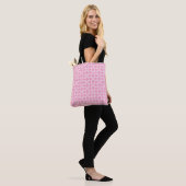 Rosa Hintergrund, modernes, nahtloses Muster. Vint Tasche (Am Model)
