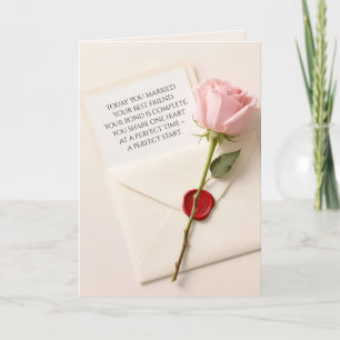 Rosa Hochzeitstil-Rose auf einer roten Waxversiege Karte