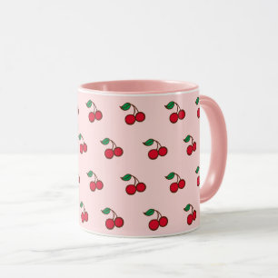 Rosa Kaffeetasse mit Kirschen