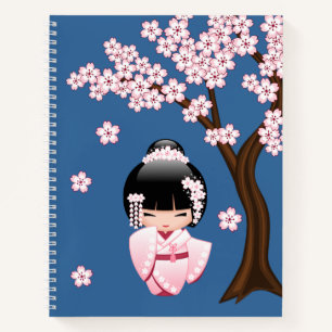 Rosa Kimono Kawaii Kokeshi-Puppe auf Blau Notizblock