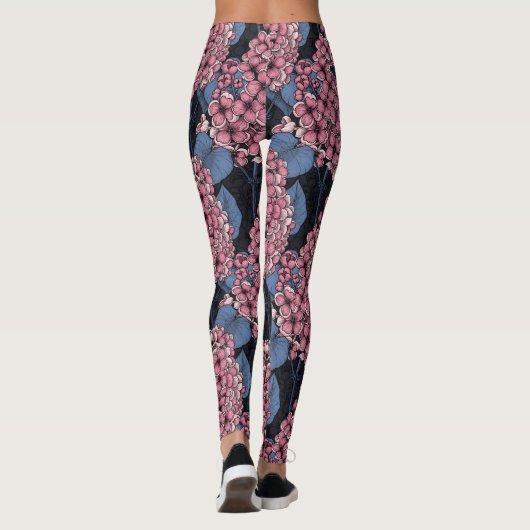 Rosa Lila auf dunkelblau Leggings (Rückseite)