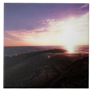 Rosa Lila Sonnenuntergang über dem Foto der Golfre Fliese