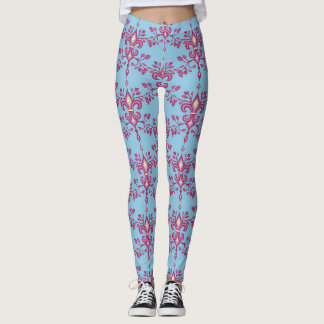 Rosa Lilie über die Leggings der blauen Frauen