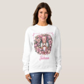 Rosa Nussknacker-Blumen-Weihnachtskranz-Bänder Sweatshirt (Vorne ganz)