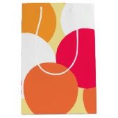Rosa, orange und gelbe Polka-Punkte Mittlere Geschenktüte (Vorderseite)