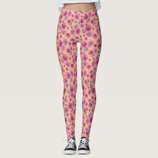 Rosa-orangefarbene Gerbera-Muster Leggings (Vorderseite)