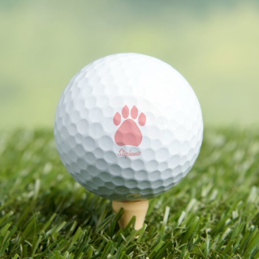 Rosa Pfotenabdruck-Design Golfball (Insitu T-Shirt)