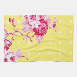 Rosa Rosen auf gelbem Küchentuch