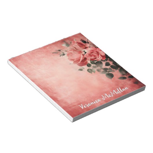 Rosa Rosen im rosa Hintergrund Notizblock (angewinkelt)