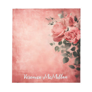 Rosa Rosen im rosa Hintergrund Notizblock