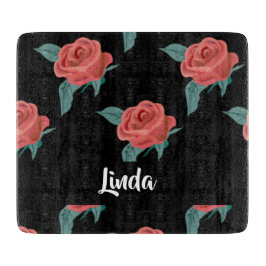 Rosa Rosen in schwarz Schneidebrett