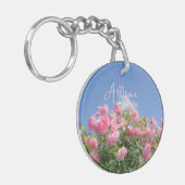 Rosa Rosenstrauch unter blauem Himmel, Brauch Schlüsselanhänger (Vorderseite links)