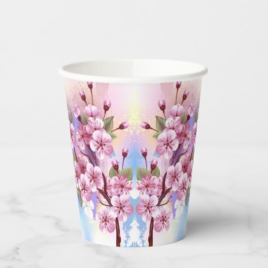 Rosa Sakura auf dem Hintergrund der Malerei Pappbecher (Links)