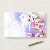 Rosa Sakura auf dem Hintergrund der Malerei Post-it Klebezettel (Auf Schreibtisch)