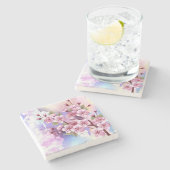 Rosa Sakura auf dem Hintergrund der Malerei Steinuntersetzer (Seitenansicht)