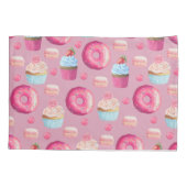 Rosa Schaumgummiringe, kleine Kuchen und Kissenbezug (Rückseite)