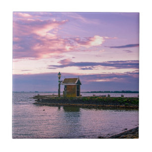 Rosa Sonnenuntergang über dem See Fliese