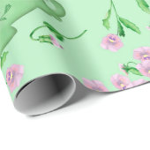 Rosa Stiefmütterchen, grüne Schüssel und Hintergru Geschenkpapier (Rolleneckpunkt)