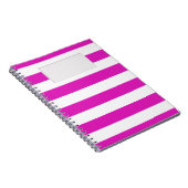 Rosa Streifen auf einer beliebigen Farbe mit Etike Notizblock (Rechte Seite)