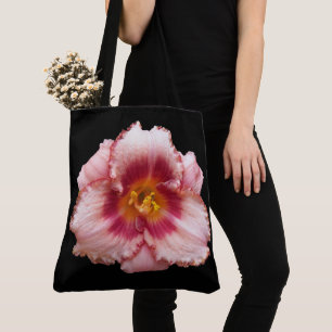 Rosa Taglilie blühen auf schwarzem Blumen Tasche
