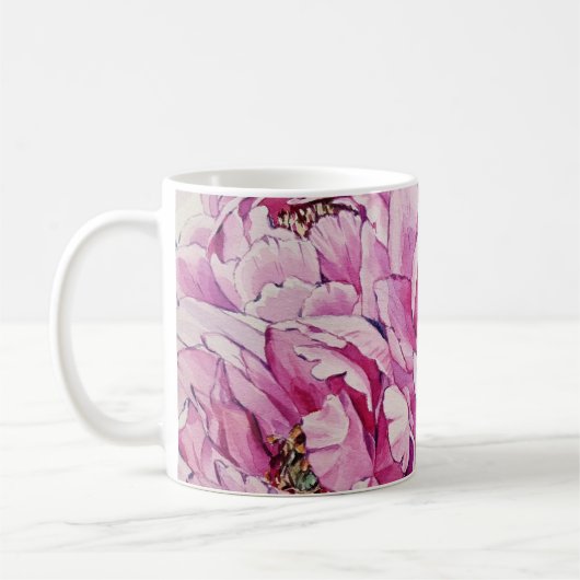 Rosa Tasse mit Blumenmuster (Links)