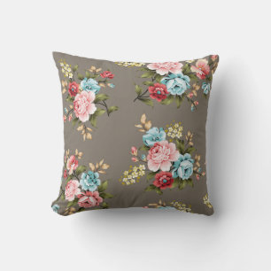 Rosa und blaue Vintage-Blumen mit Grün und Creme Kissen