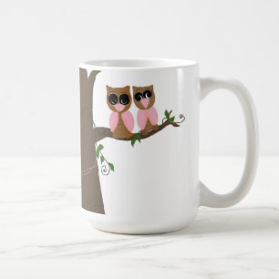 Rosa und braune Eulen auf einem Ast Kaffeetasse
