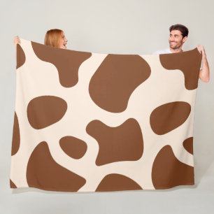 Rosa und brauner Kuhdruck Fleecedecke
