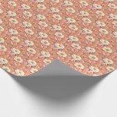 Rosa- und Elfenbeinerden auf Mute Orange Geschenkpapier (Ecke)