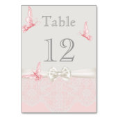 Rosa und Elfenbeinschmetterlinge und Spitzentafelk Tischnummer (Rückseite)