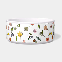 Rosa und gelbe Herbstblumen und Blätter Napf