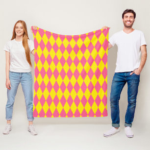 Rosa und gelbes Harlekin-Karuomuster-Design Fleecedecke