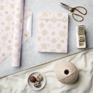 Rosa und goldene Schneeflocken Geschenkpapier