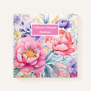 Rosa und lila Aquarellblumen-Spiralfeuer Notizblock
