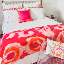 Rosa und orangefarbene Tribal Ikat Fleecedecke