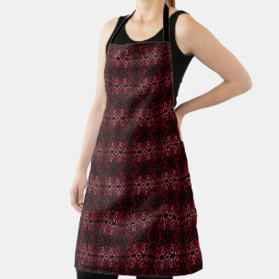 Rosa und rote Punkte und Schlängelchen-Muster auf  Schürze