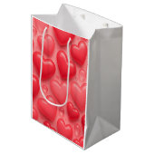 rosa und rotes Herz-Blasen-Muster Mittlere Geschenktüte (Vorderseite Schrägansicht)