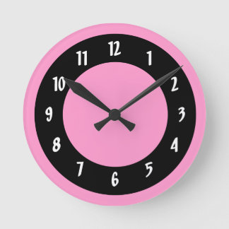 Rosa und schwarze Kreise Runde Wanduhr