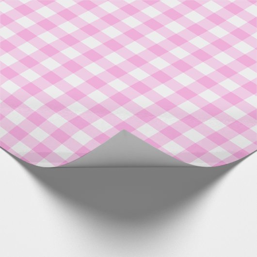 Rosa und weiße gemusterte Verpackung des Ginghams Geschenkpapier (Ecke)