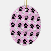 Rosa Untergrund: erschütterte schwarz-weiße Paws Keramikornament (Rechts)