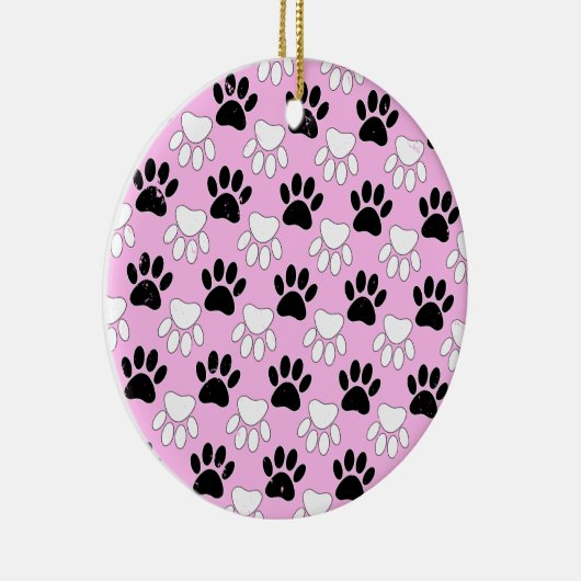 Rosa Untergrund: erschütterte schwarz-weiße Paws Keramikornament (Rechts)