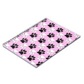 Rosa Untergrund: erschütterte schwarz-weiße Paws Notizblock (Linke Seite)