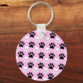Rosa Untergrund: erschütterte schwarz-weiße Paws Schlüsselanhänger (Vorderseite)